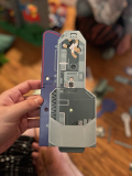 What is this puzzle kit/toy from a thrift store that doesn’t have instructions or any identifying labels? Astronauts, gear, clear plastic grommets, space ships and shuttles, each piece is numbered. Can’t find a match on web/image search.