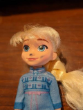 What paint should I use to touch up this Elsa doll? : toys