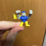 Found this at work. Seems to be a construction Monkey! The top half disconnects from the bottom yellow half
