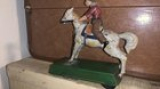 Anyone have much info on this antique German tin wind up bucking cowboy toy?