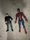 Old superhero movie toys. Val Kilmer Bruce Wayne (1995) and Tobey Maguire Spider-Man (2002)